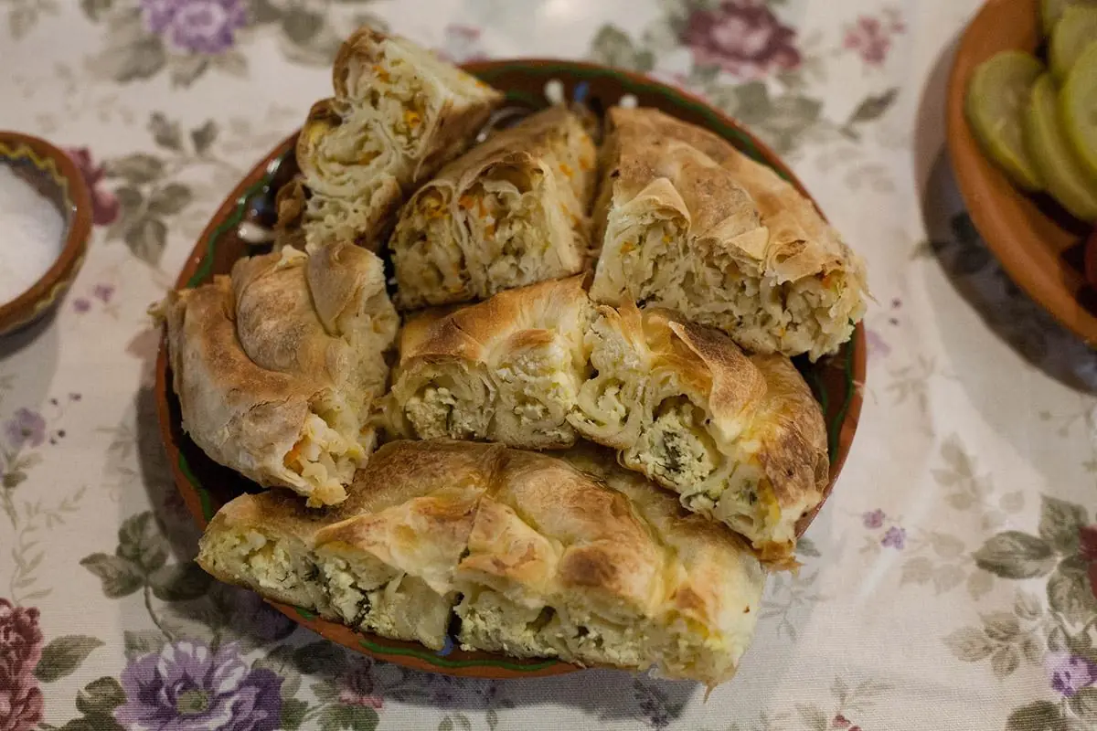 Layered Plăcintă pastry with cheese filling